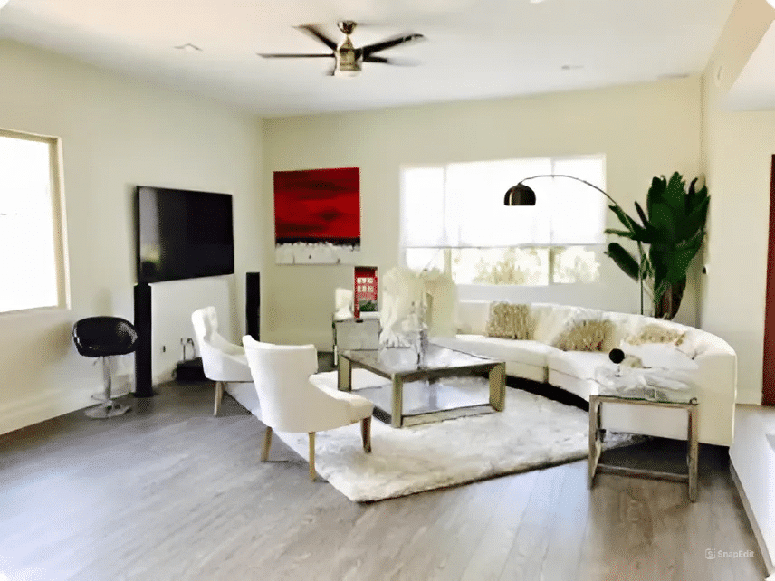 Cozy home with clean floors, pet bed, and sunlight streaming in